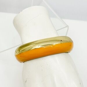 Gold tone enamel hinged bangle bracelet